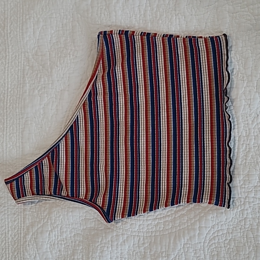M One strap crop top. Ribbed texture, stripes and wrapped seam on bottom
